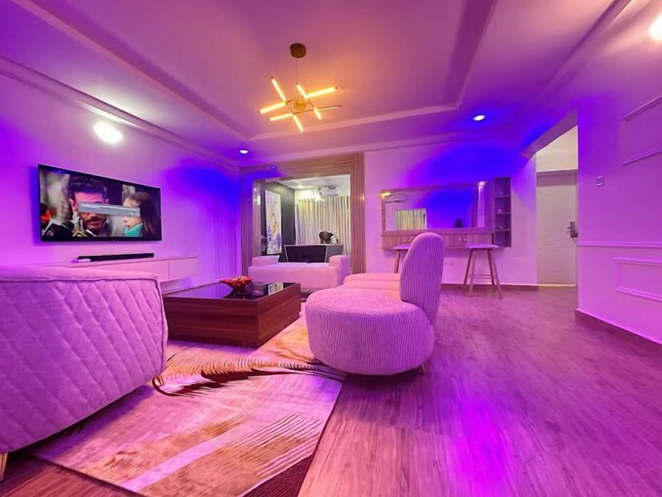 Luxury Apartment, Balcony, City View | Living area | Flat-screen TV