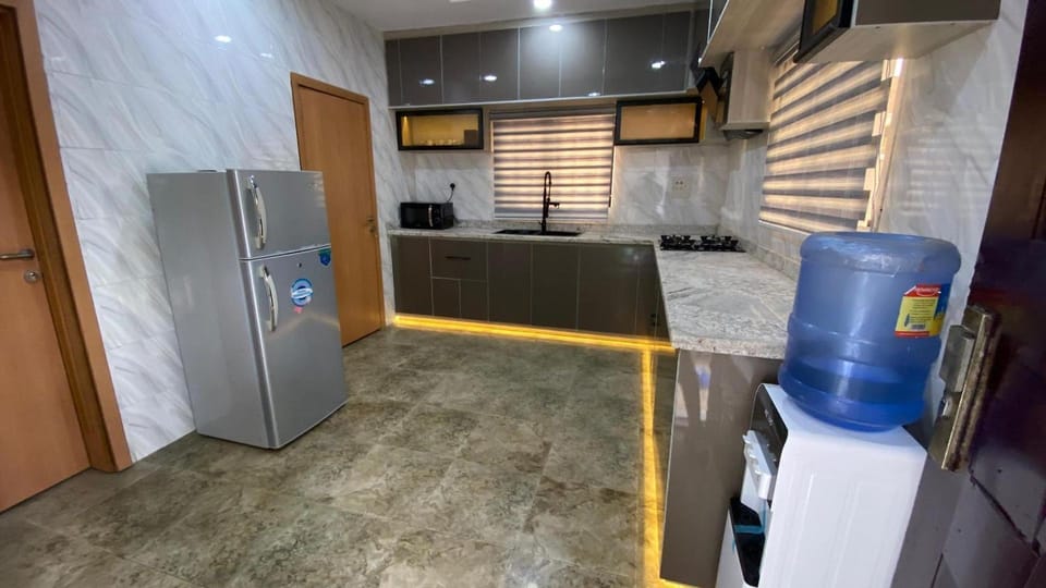 Luxury Apartment, Balcony, City View | Private kitchen | Fridge, microwave, oven, stovetop