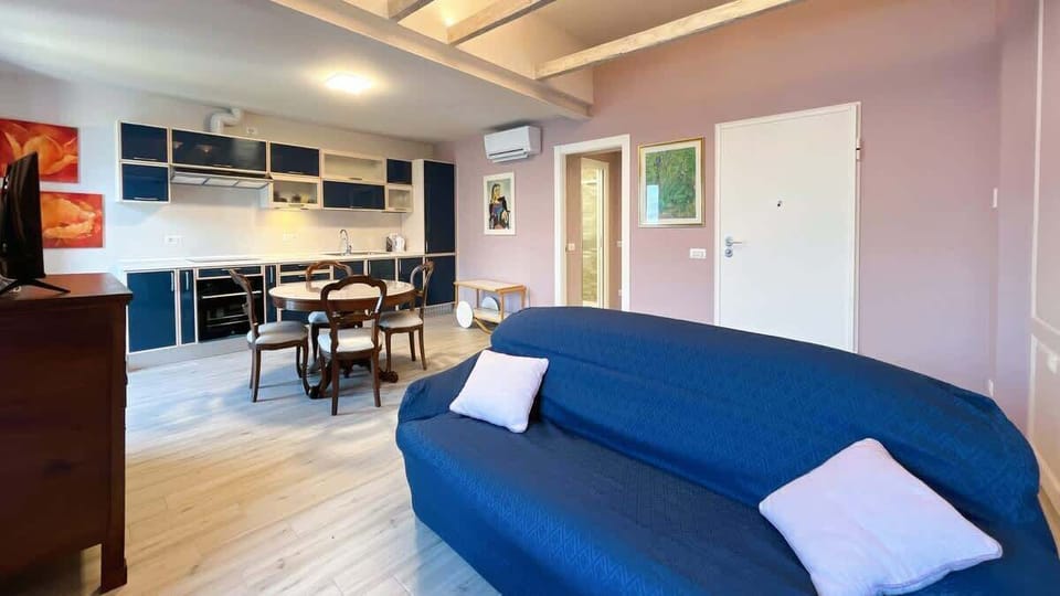 Comfortable living room with open kitchen