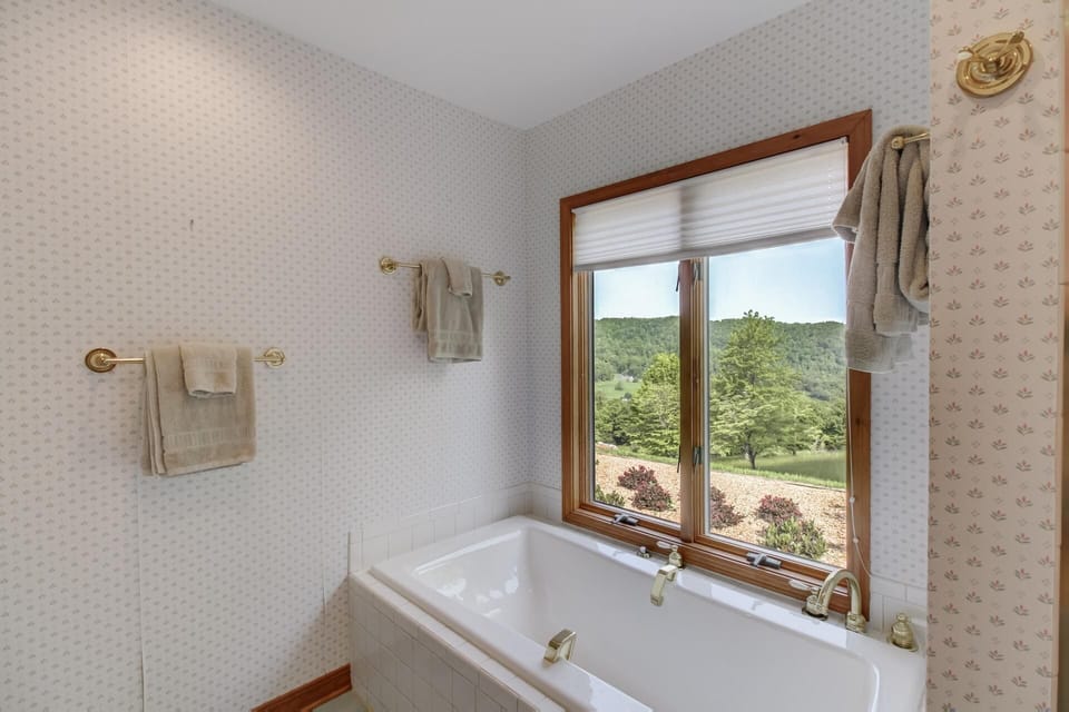Soak in one of the 2 tubs with a view