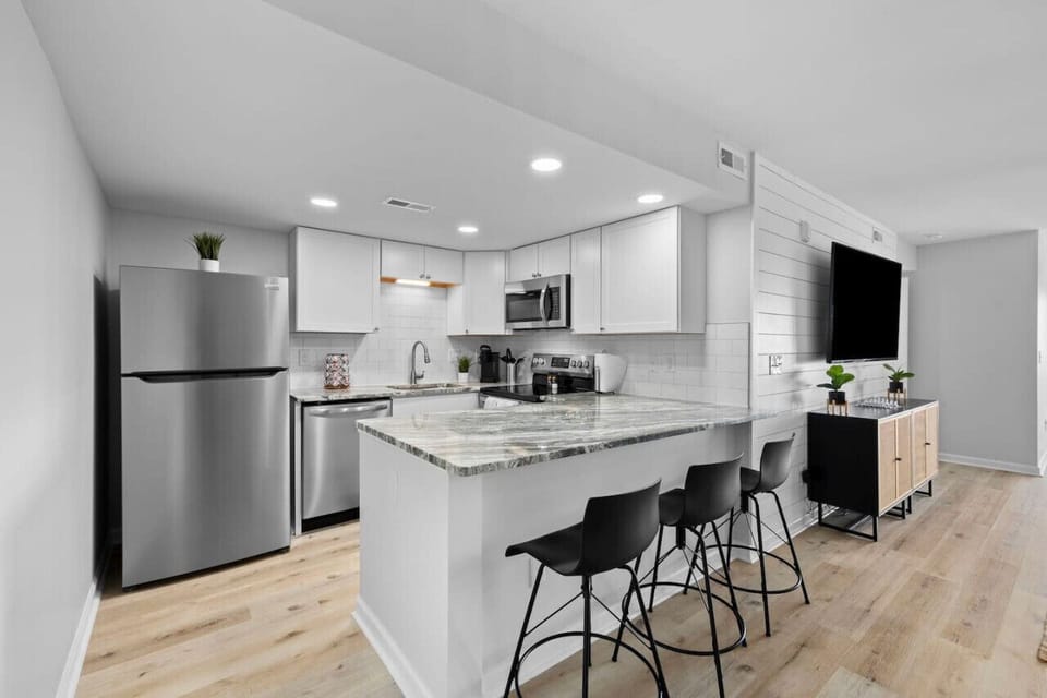 Modern kitchen with barstool seating