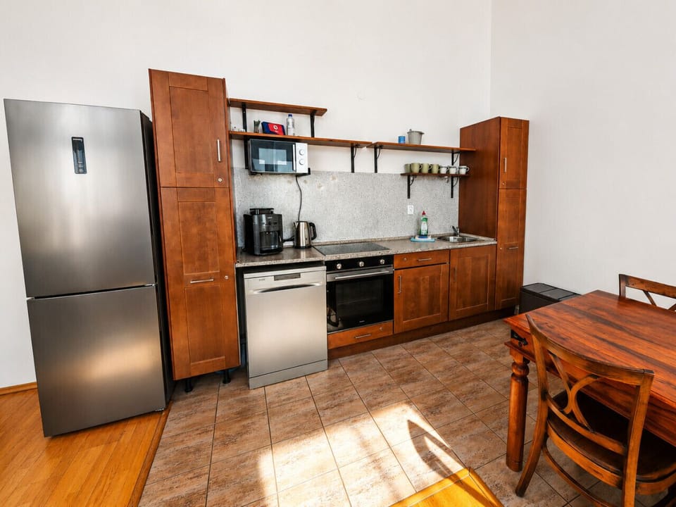 Kitchen: Culinary adventures await in this stylish space with modern appliances and inviting decor!