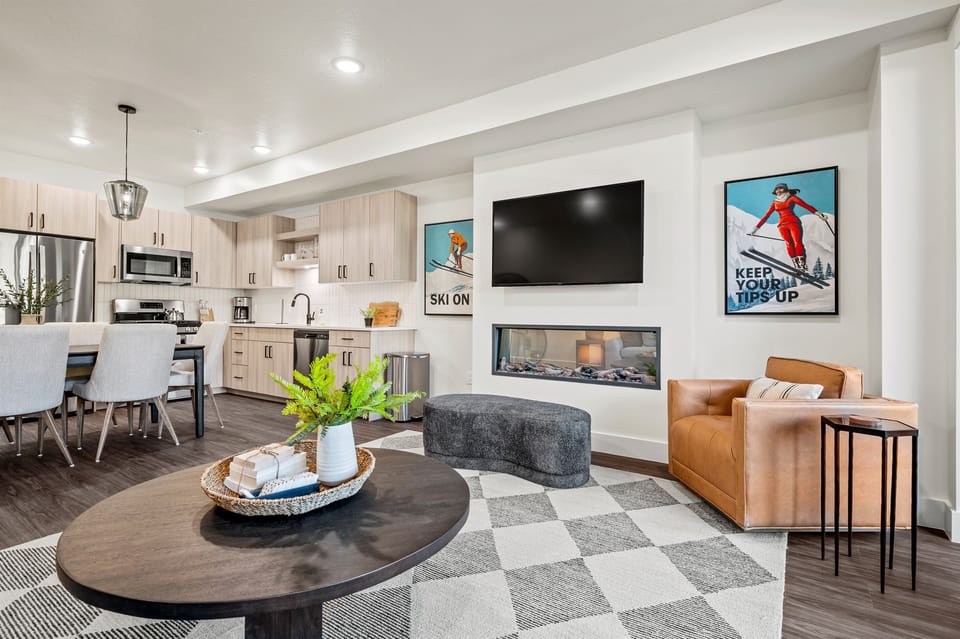 The electric fireplace adds a warm ambiance and a gentle glow.