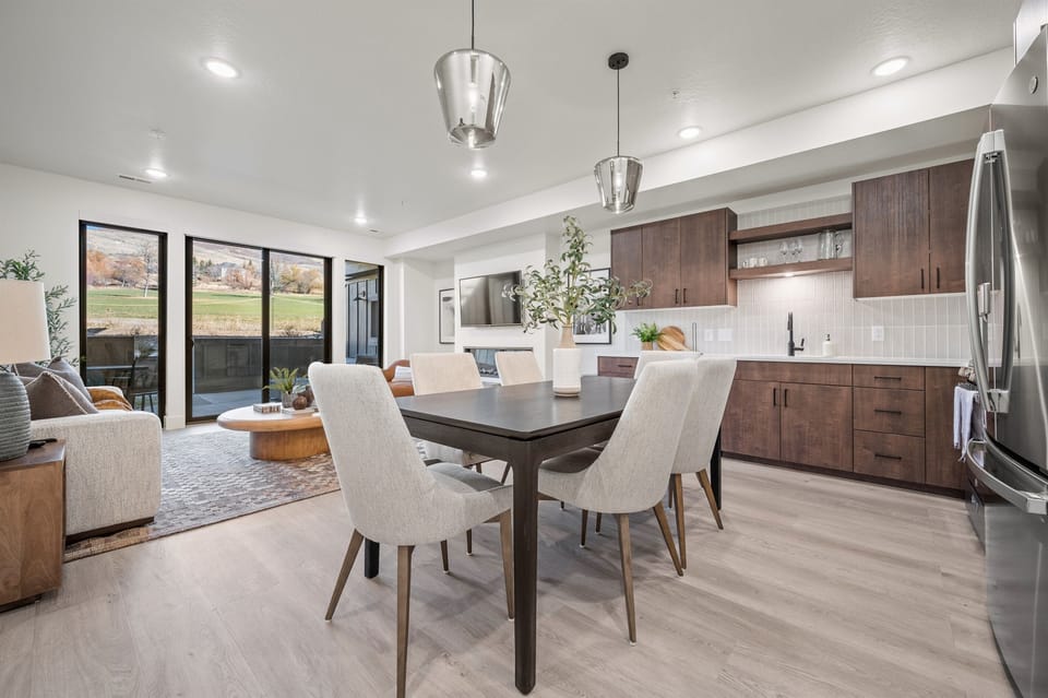 Enjoy the view from the living area, dining area, and kitchen.