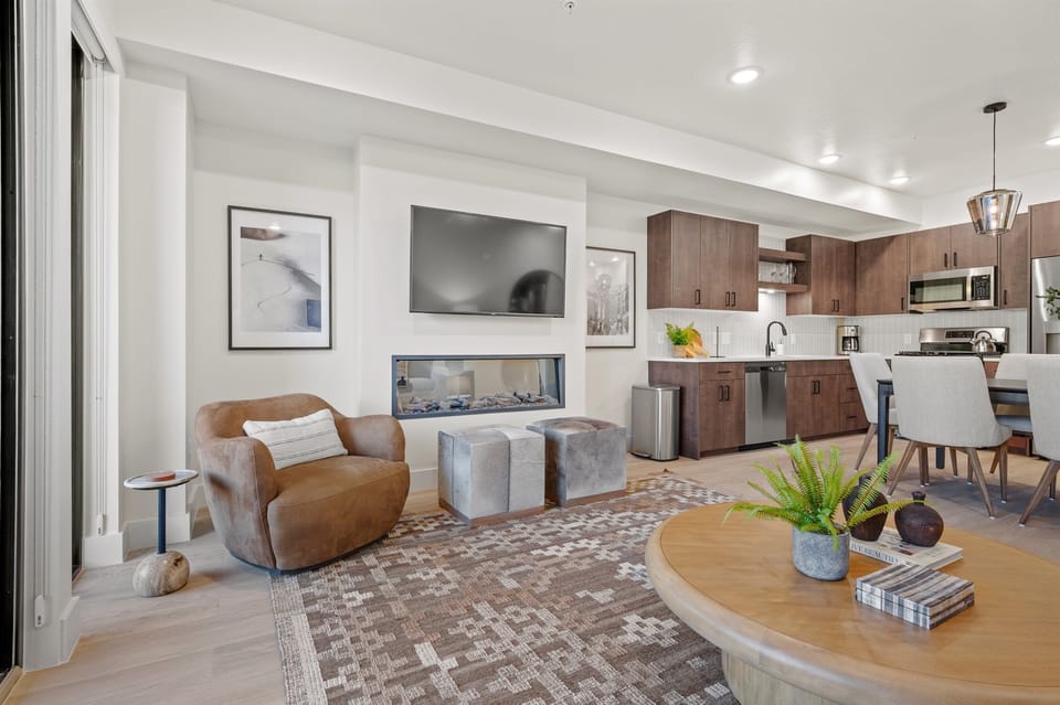 The electric fireplace adds a warm ambiance and a gentle glow.