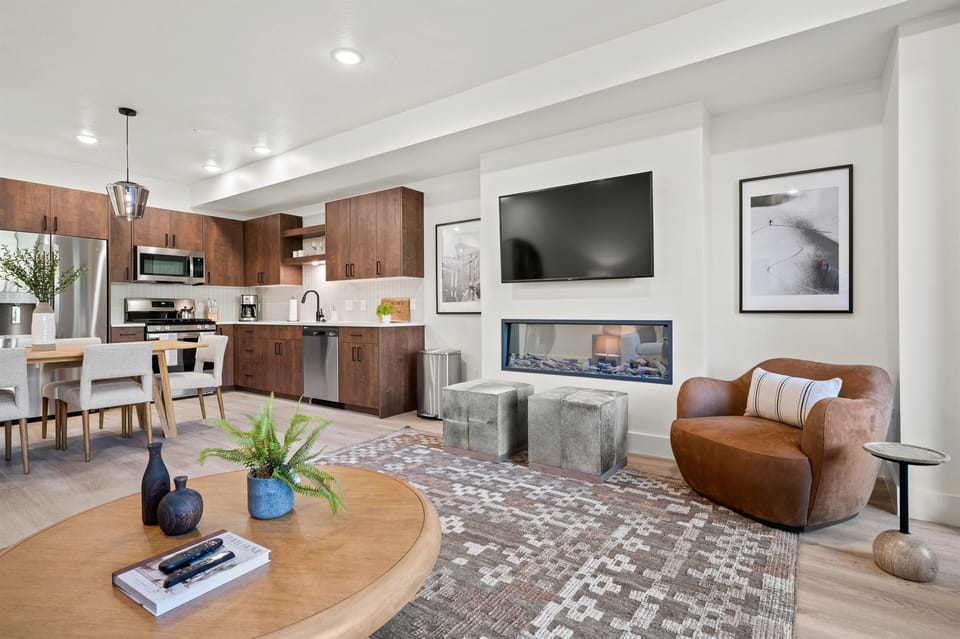 The electric fireplace adds a warm ambiance and a gentle glow.