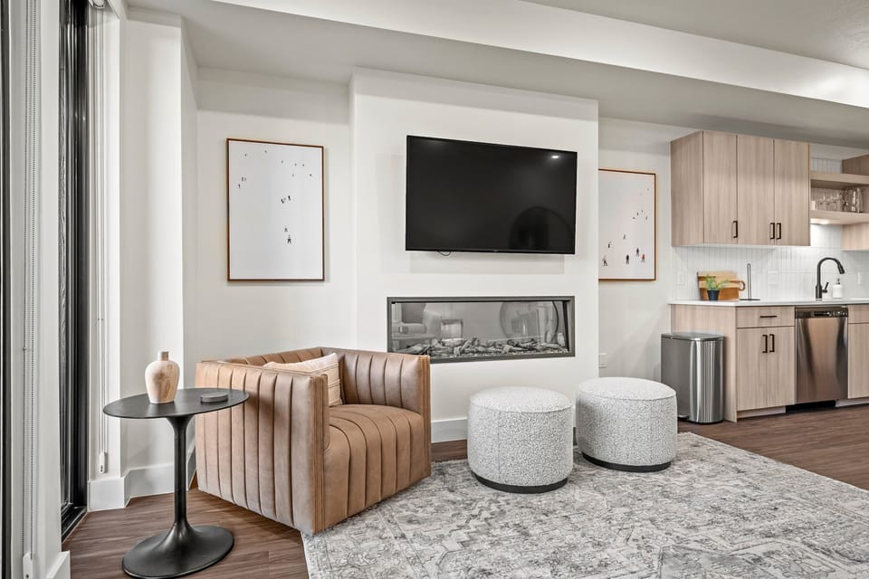 The electric fireplace adds a warm ambiance and a gentle glow.