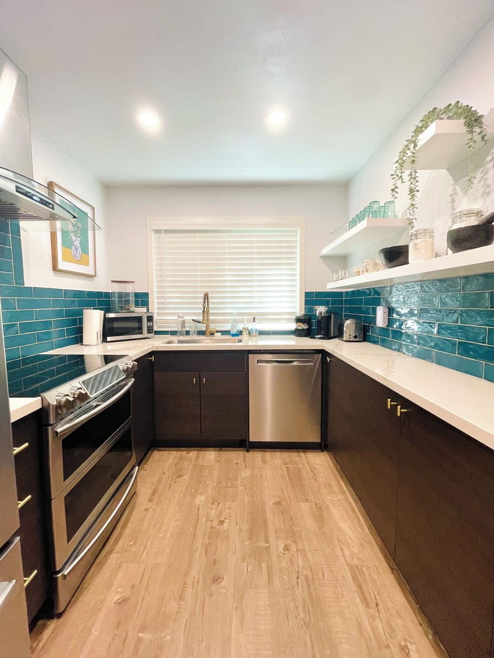 U-shaped kitchen may look small, but is fully equipped with anything cooks need!