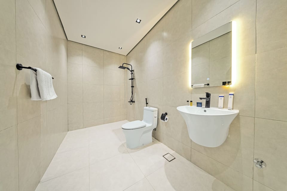 Economy Studio | Bathroom | Slippers, towels, soap, shampoo