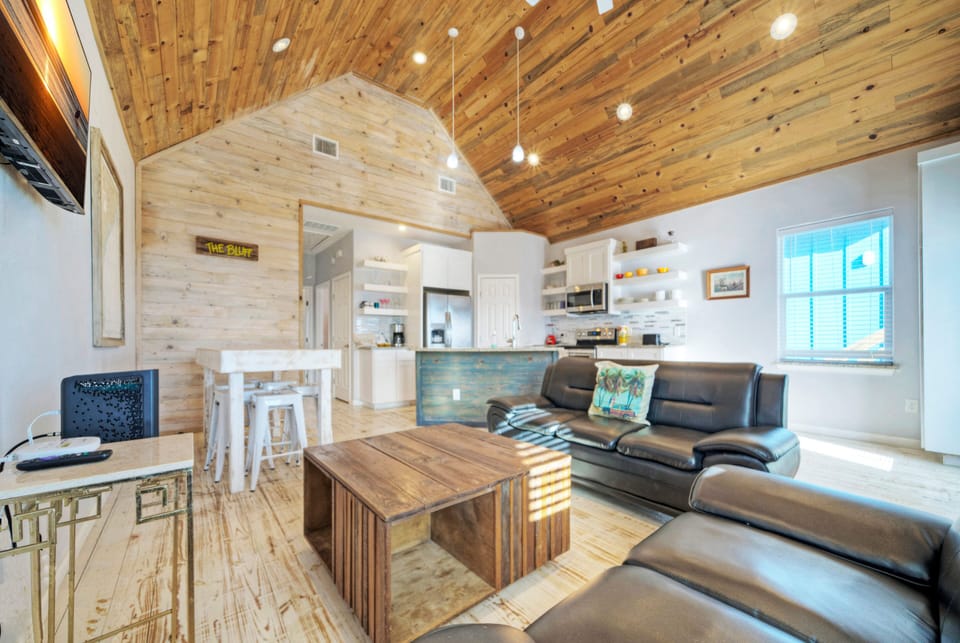 Living area with plenty of comfortable seating.