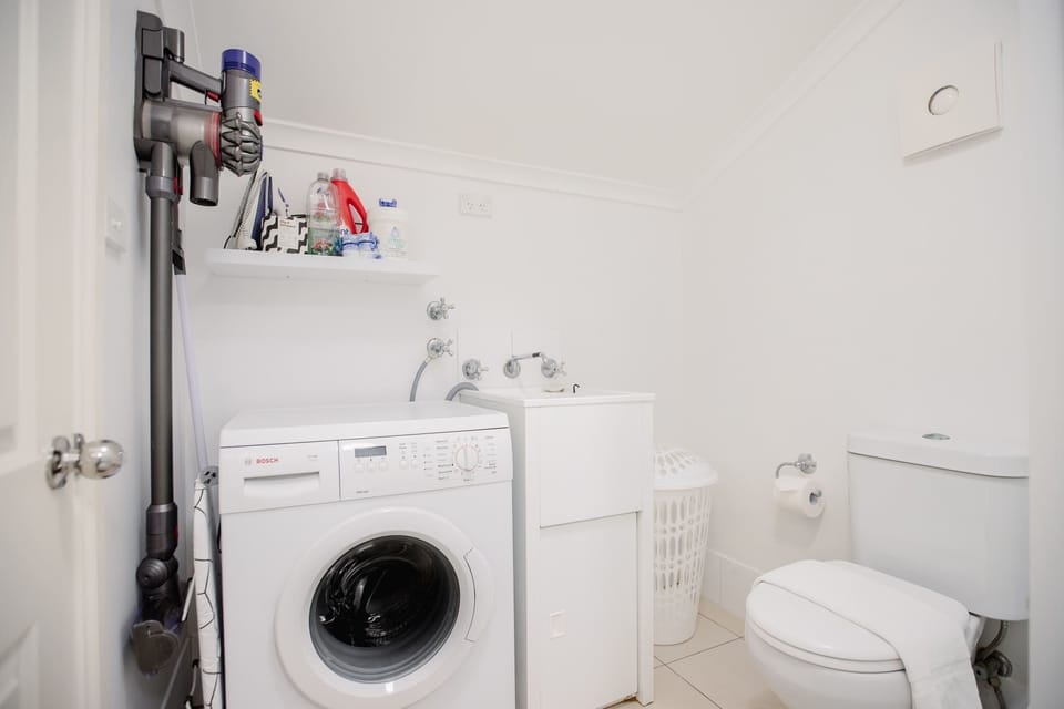 Laundry / 2nd Bathroom  w Toilet & Shower
