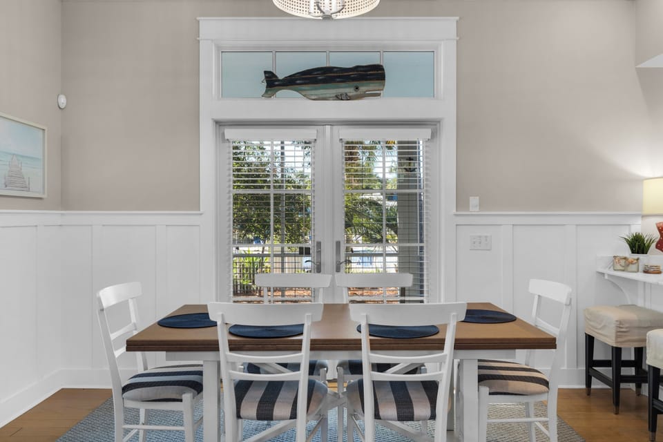 Gather around your beautiful dining table where coastal charm meets comfort, perfect for memorable meals with loved ones.