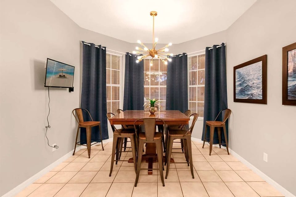 Elegant dining area with seating for eight, perfect for family meals and gatherings.