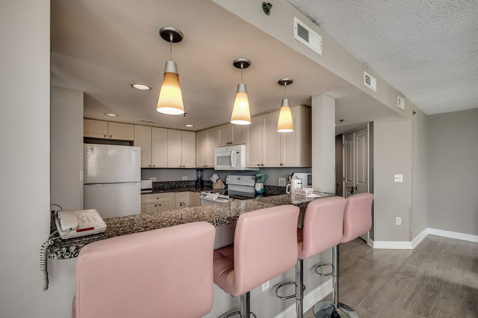 Fully equipped kitchen with granite countertops