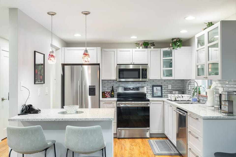 A clean, modern kitchen with everything you need. Thoughtfully stocked and ready for real meals or quick snacks.