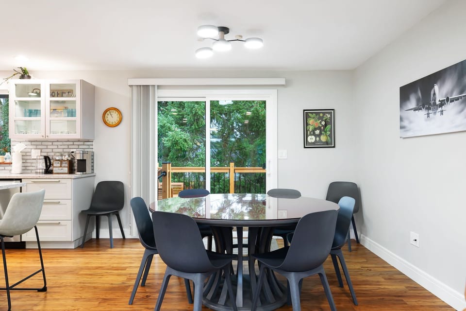 Enjoy meals in the spacious dining area with patio access. Perfect for slow breakfasts or dinners that stretch into the evening.