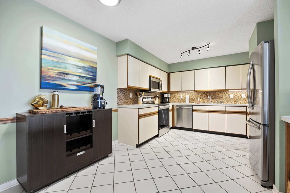 The open kitchen is spacious & offers all the comforts of home