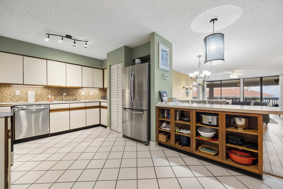 The open kitchen is spacious & offers all the comforts of home