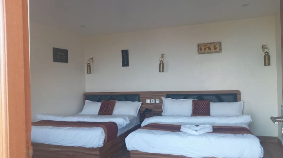 Desk, laptop workspace, WiFi (free), bed sheets