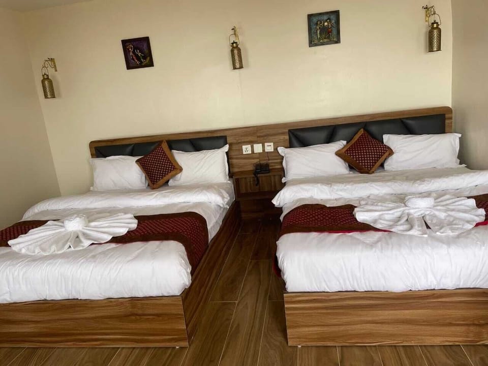 Desk, laptop workspace, WiFi (free), bed sheets
