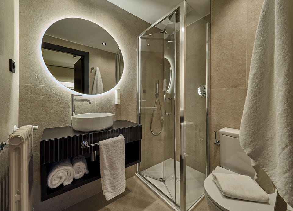 Small Room | Bathroom | Shower, hair dryer, towels, soap