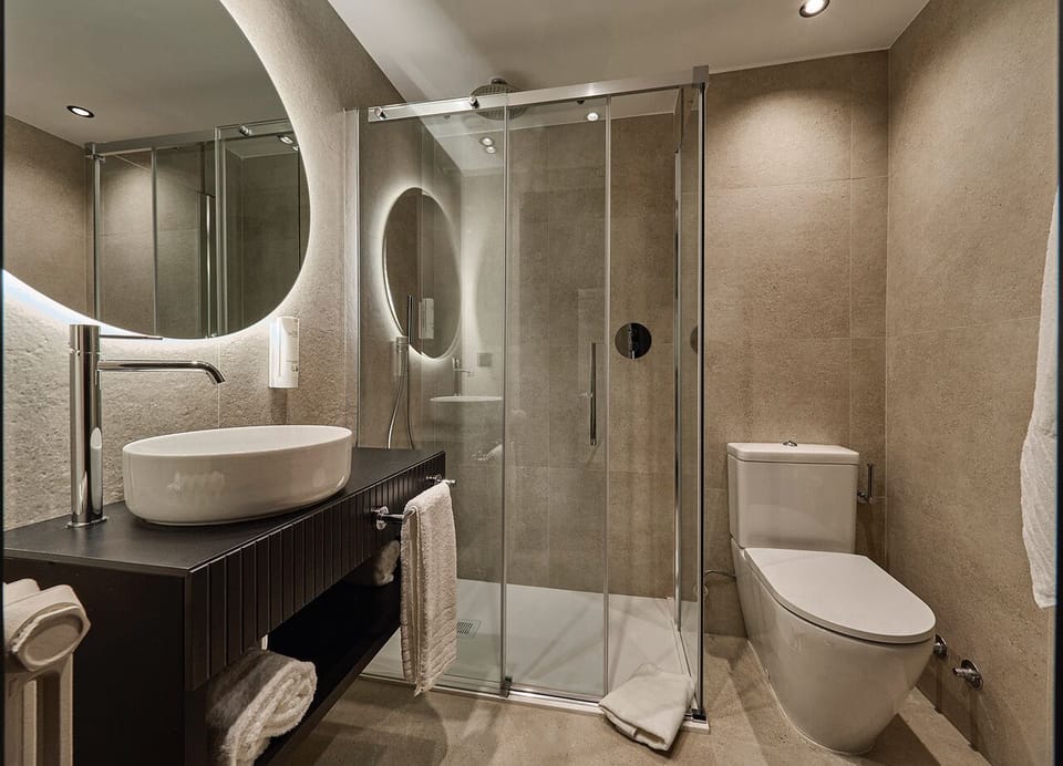 Double Room | Bathroom | Shower, hair dryer, towels, soap