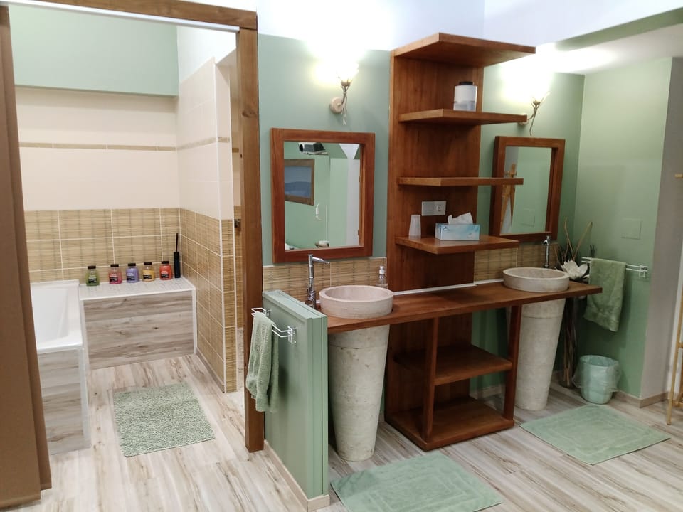 Comfort Quadruple Room, River View | Bathroom | Hair dryer, towels, soap