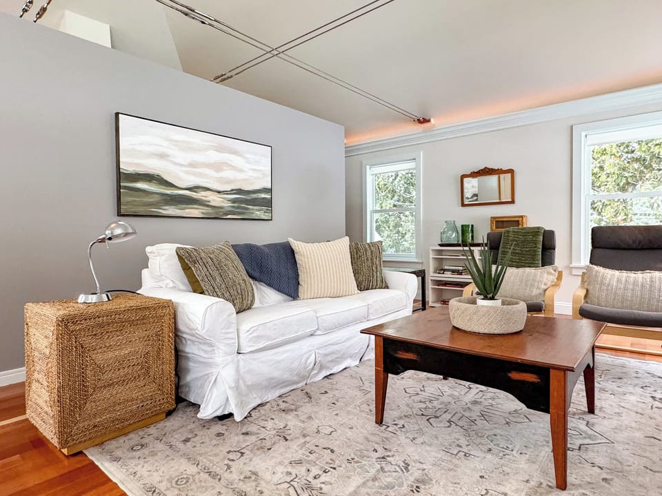 Comfy living room with 55' flat screen TV for watching football or your favorite movie on a rainy day. 