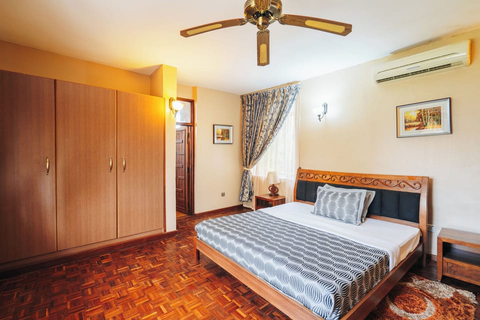Deluxe Apartment, 3 Bedrooms, Garden View | 3 bedrooms, blackout drapes, iron/ironing board, free WiFi