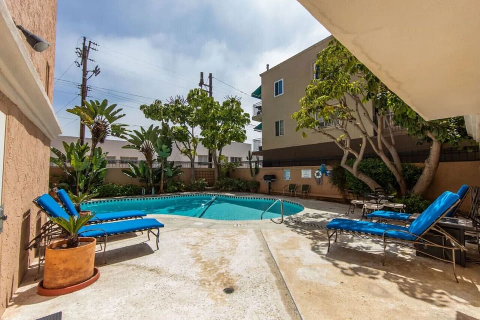 Step outside to take a dip in the communal pool.
