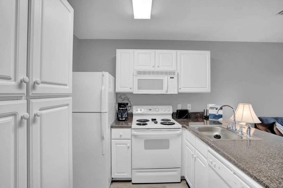 Condo, 1 Queen Bed with Sofa bed (Grand Caribbean 225) | Private kitchen | Oven, toaster