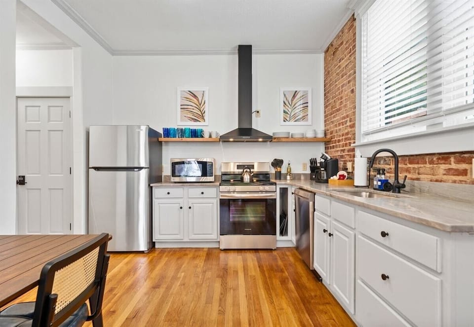 The kitchen is designed with functionality and style in mind, offering everything you need for meal prep.