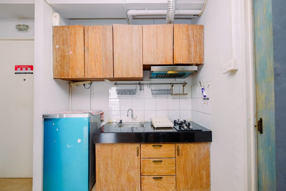 Deluxe Apartment | Private kitchen | Fridge, stovetop, rice cooker
