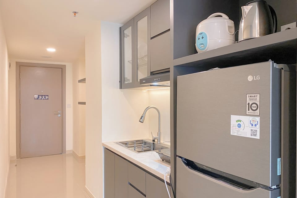 Deluxe Apartment | Private kitchen | Fridge, stovetop, rice cooker