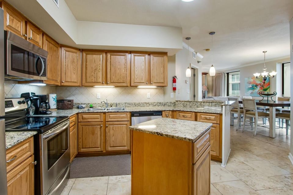 Condo, Multiple Beds (Pelican Pointe 1406) | Private kitchen | Oven, dishwasher, toaster