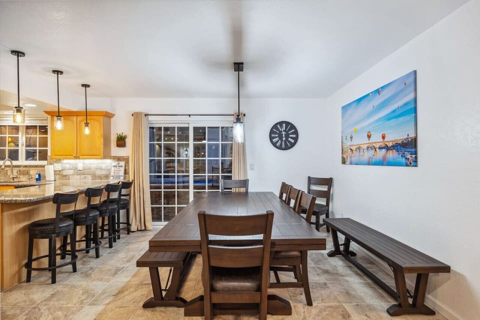 Dining table that can seat up to 12 comfortably with an additional bench for additional seating arrangement