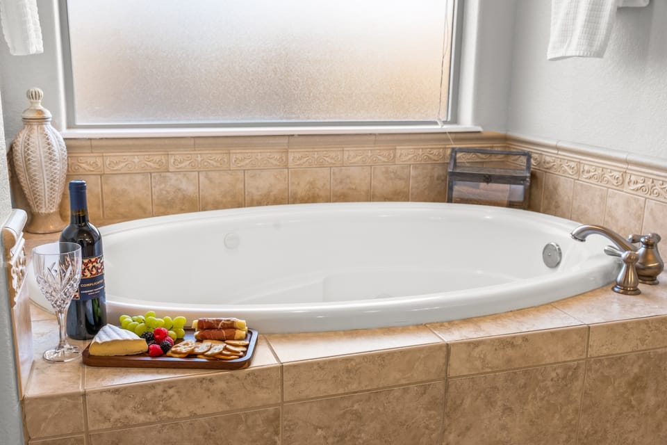 Unwind in the spacious soaker tub at the end of your adventurous day.