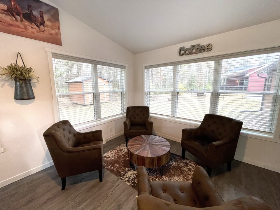 Sunroom with Comfortable Seating, Table & Chairs & Coffee Bar
