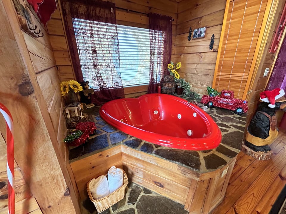 Relax in your heart shaped whirlpool tub