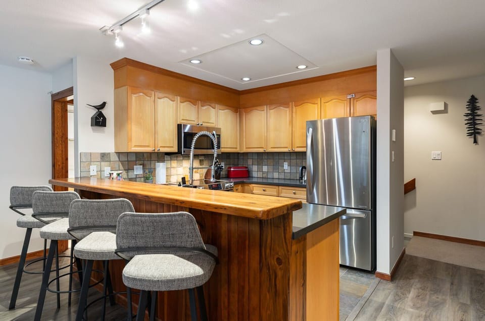 Enjoy preparing meals in the open-concept kitchen with ample counter space and convenient layout.