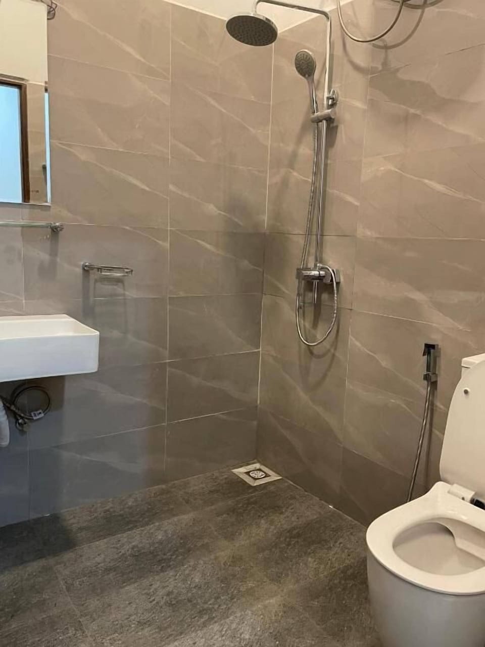 Shower, slippers, towels, soap
