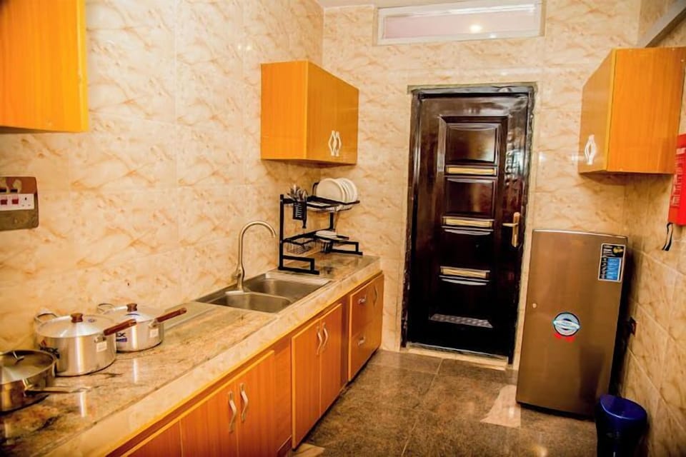 Economy Apartment, Balcony, City View | Private kitchen | Fridge, microwave, oven, stovetop