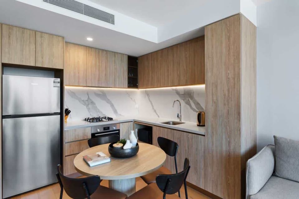 Fully equipped kitchen featuring high-quality appliances and essential consumables, ready for all your culinary needs.