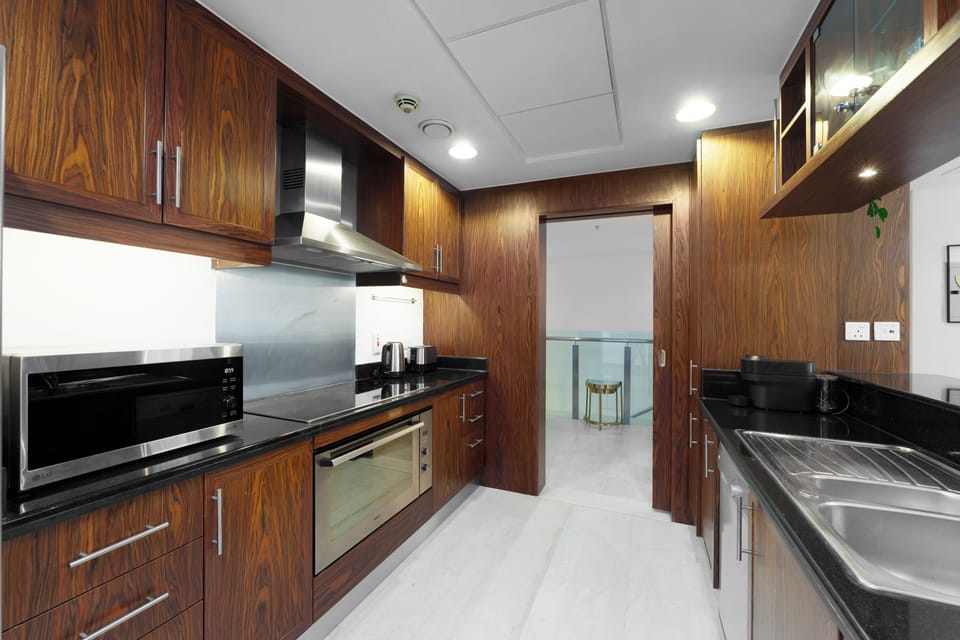 Exclusive Villa, 3 Bedrooms, Balcony | Private kitchen | Fridge, microwave, oven, dishwasher