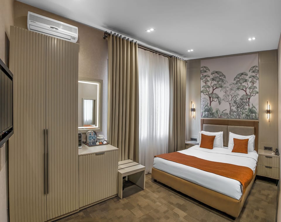 Standard Double Room | In-room safe, individually decorated, desk, laptop workspace