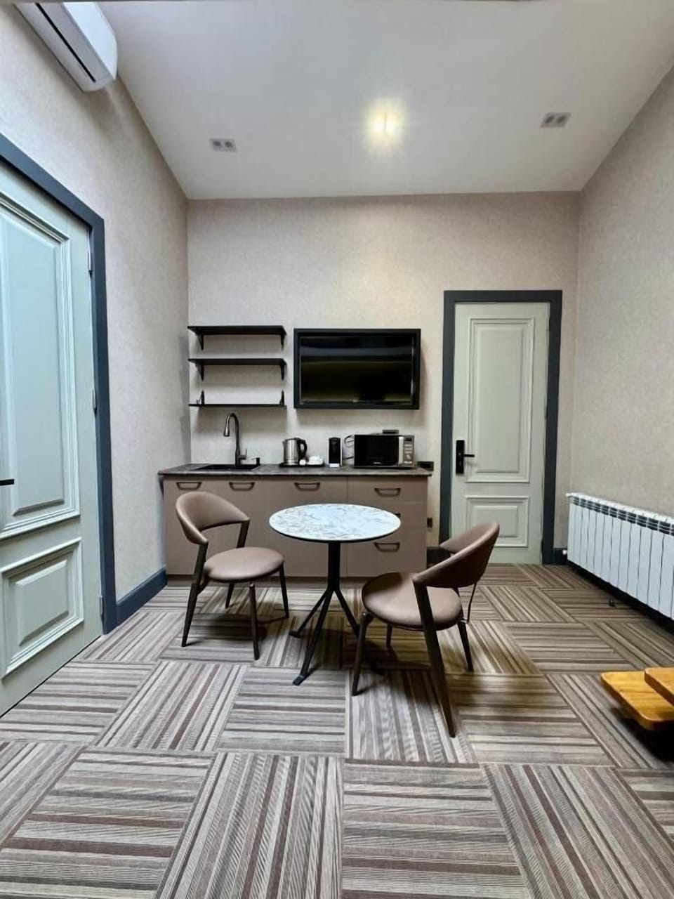 Signature Quadruple Room | In-room safe, individually decorated, desk, laptop workspace