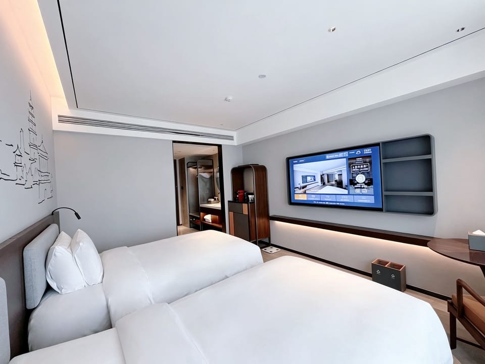Luxury Twin Room, Non Smoking, City View | Minibar (free items), in-room safe, desk, WiFi (free)
