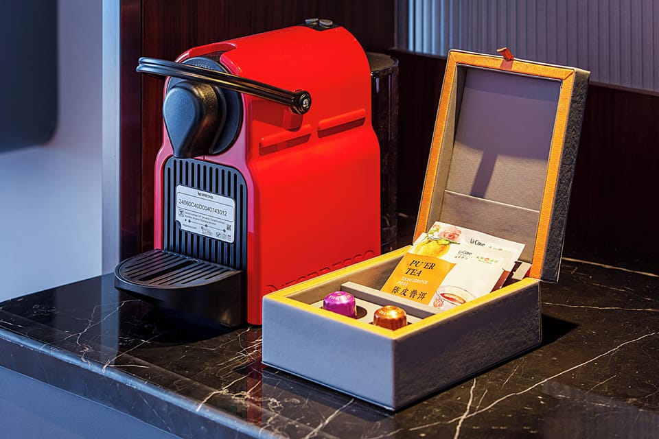Minibar (free items), in-room safe, desk, WiFi (free)