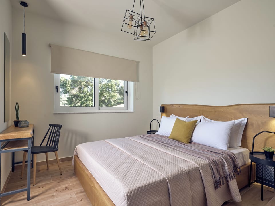 First Floor Master bedroom featuring a queen size bed. 