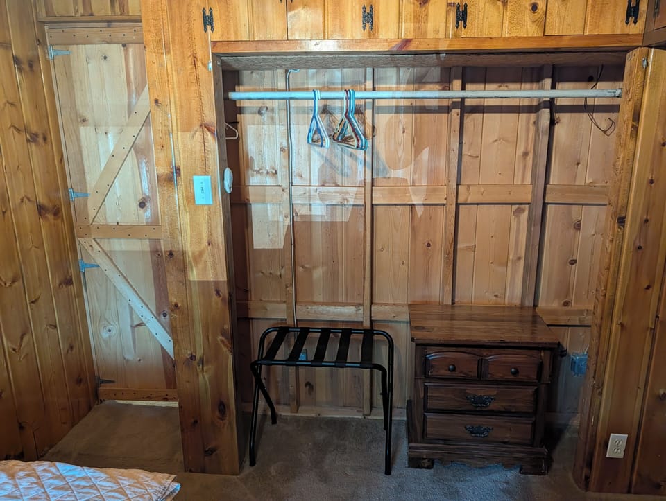 BEDROOM #2:  Features 2 twin size beds, nightstand, lamp, closet, dresser, and luggage stand